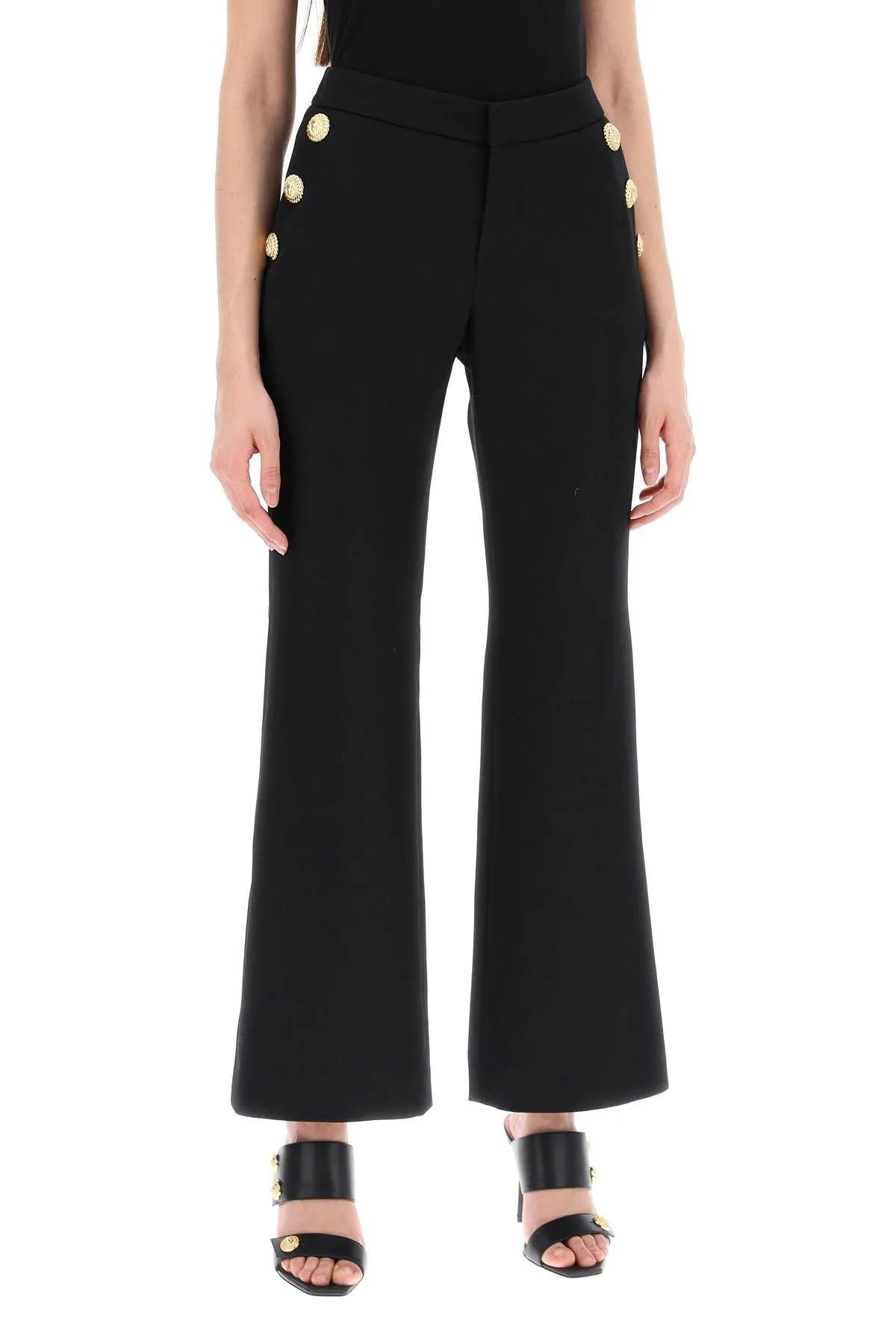 Pantaloni svasati con bottoni goffrati